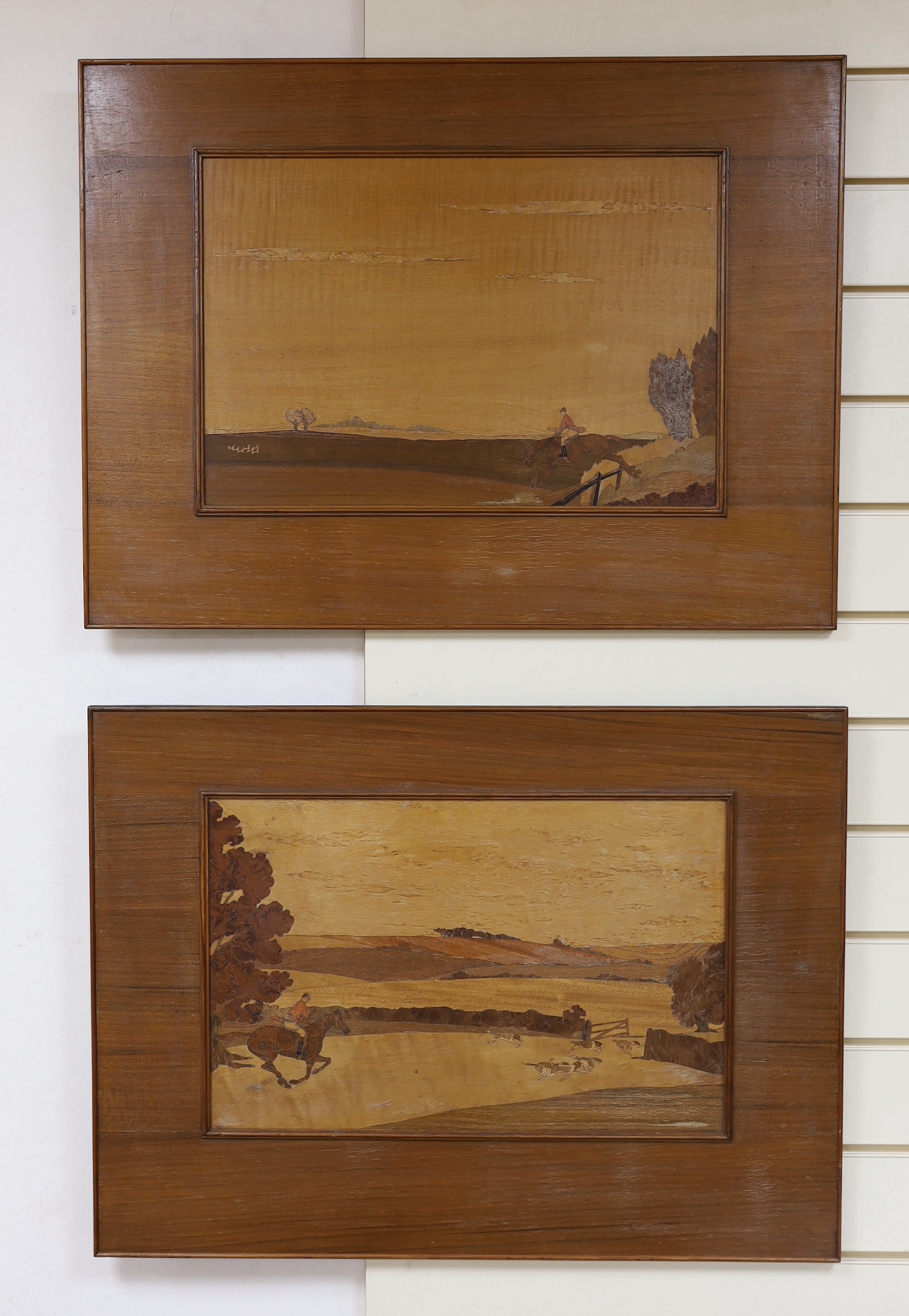 A pair of Rowley Gallery style marquetry panels, depicting hunting scenes, 31 x 48cm, overall 52 x 70cm